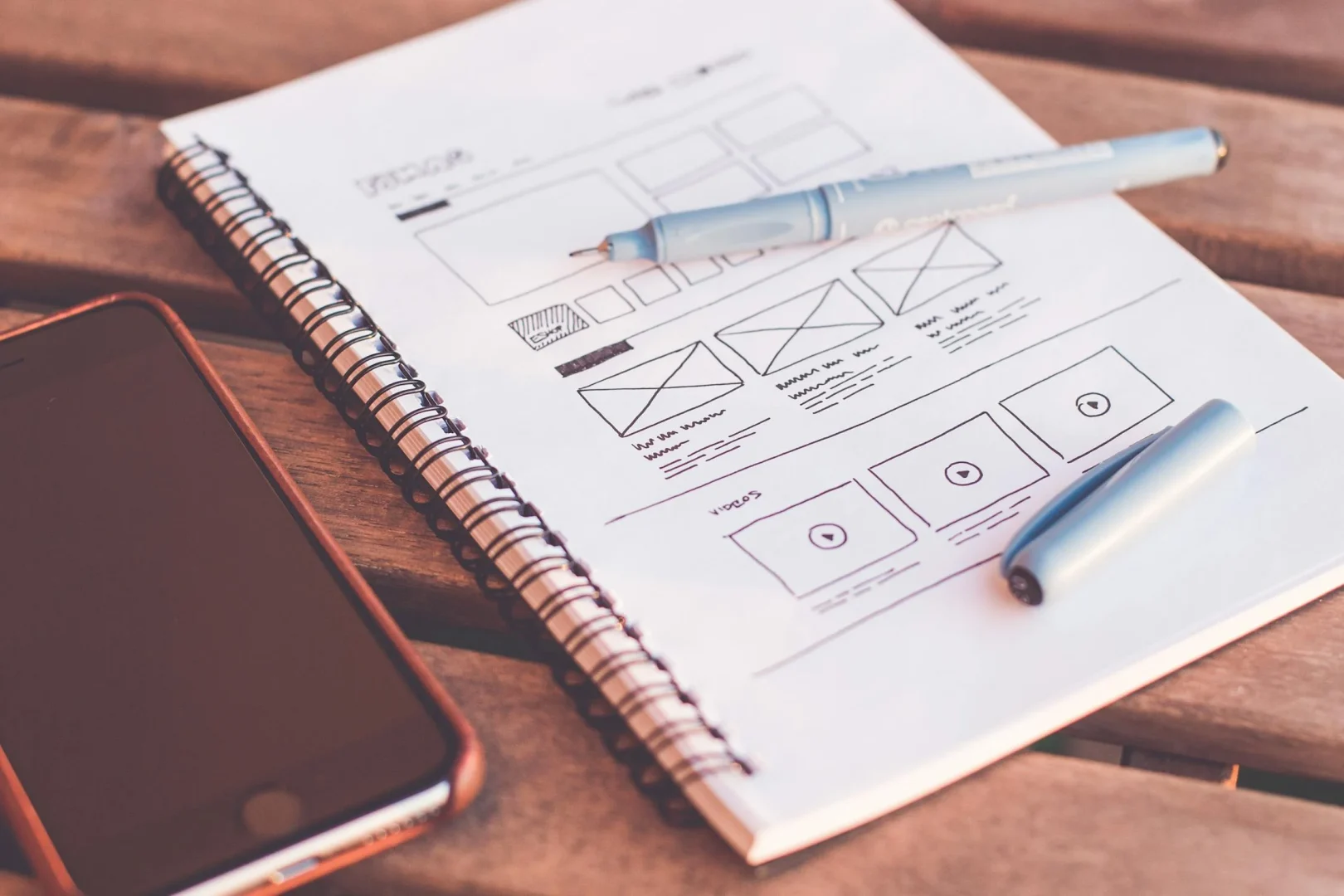 Non-designer creating website with AI website builder on laptop