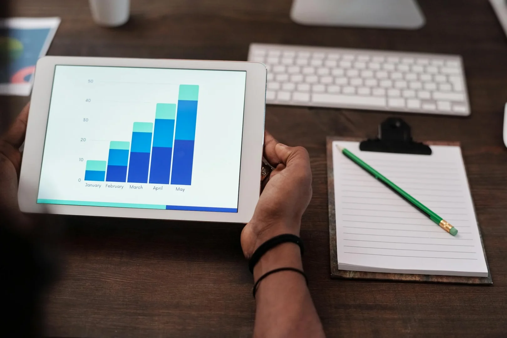 Solopreneur using all-in-one marketing platform on laptop