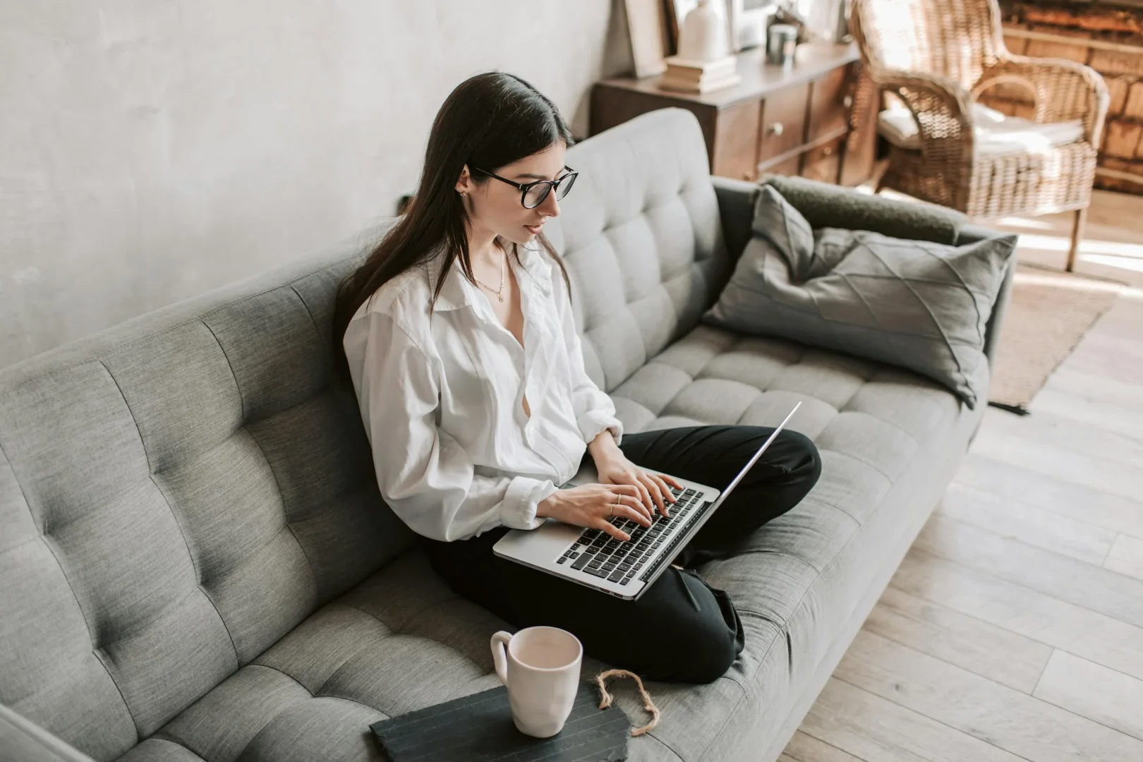 Blogger working on content optimization on laptop