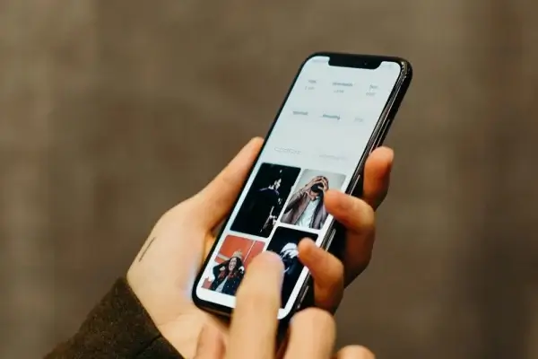 Instagram app on phone showing photo grid feed display