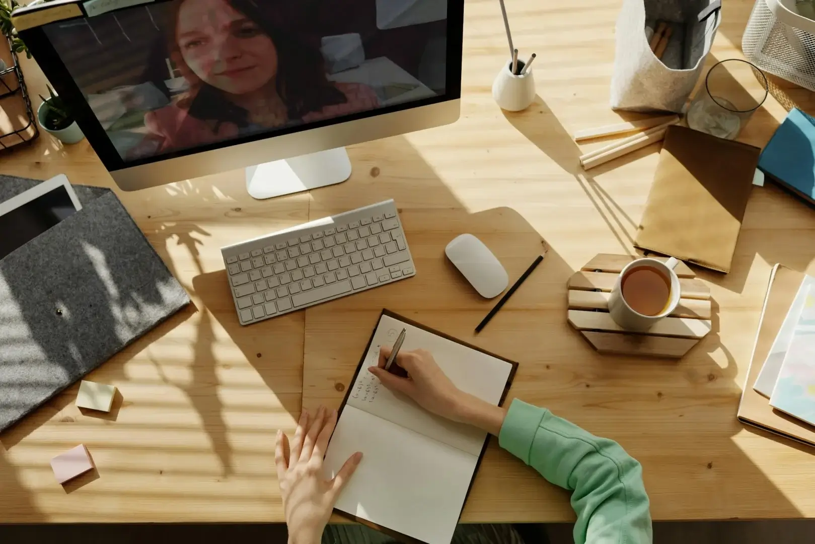 Person chatting with an AI assistant on a laptop to design a website