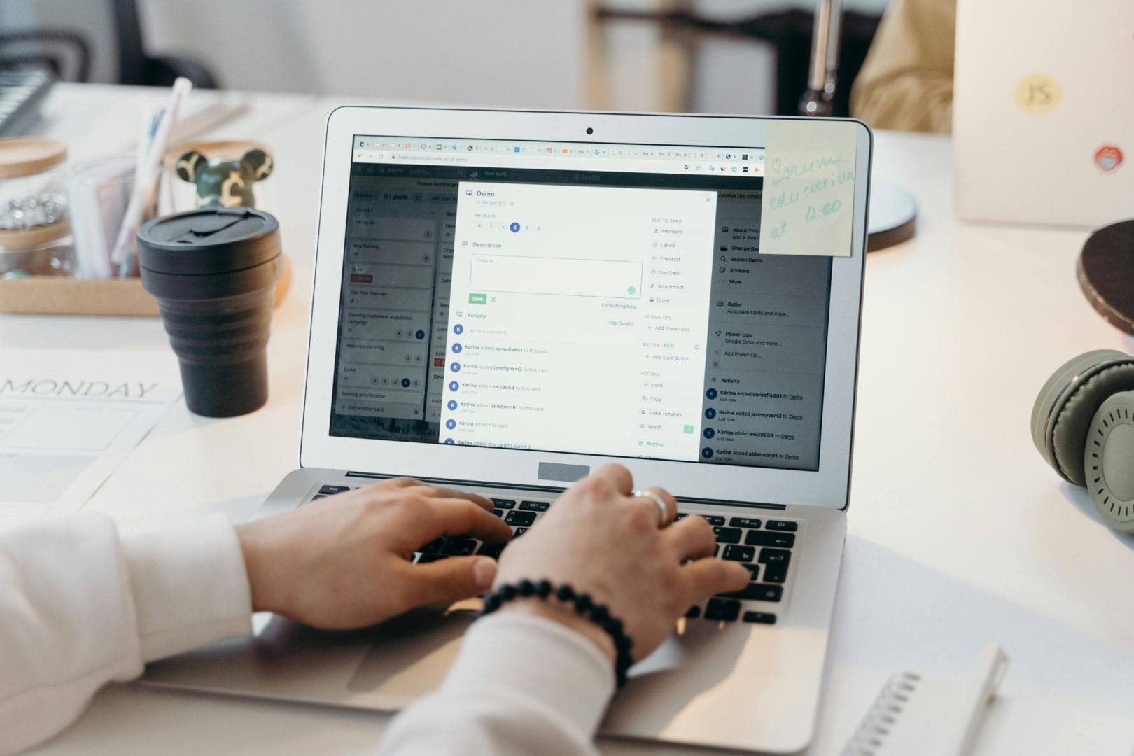 Person typing cold email on laptop comparing Lemlist and Instantly platforms