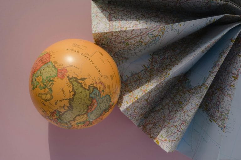 Globe and map representing global print-on-demand fulfillment