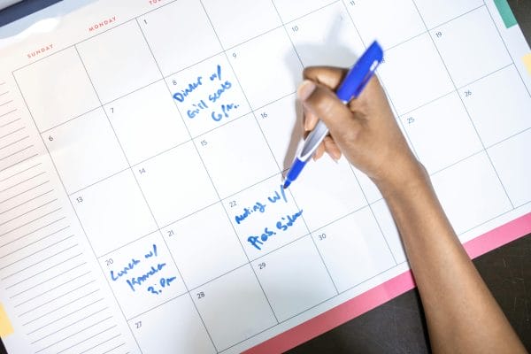 Calendar with appointments representing WordPress booking plugin comparison