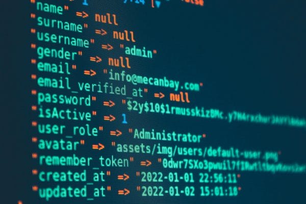 Code on monitor representing modern hosting control panel comparison